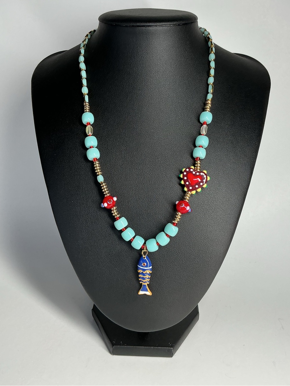 Turquoise Bead Necklace with Red Accents and Blue Fish Charm
